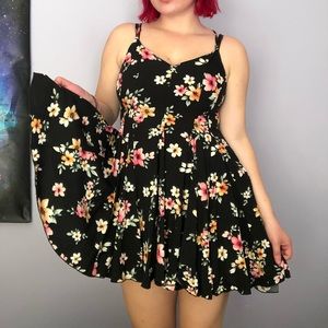Short, floral printed, black sundress.
